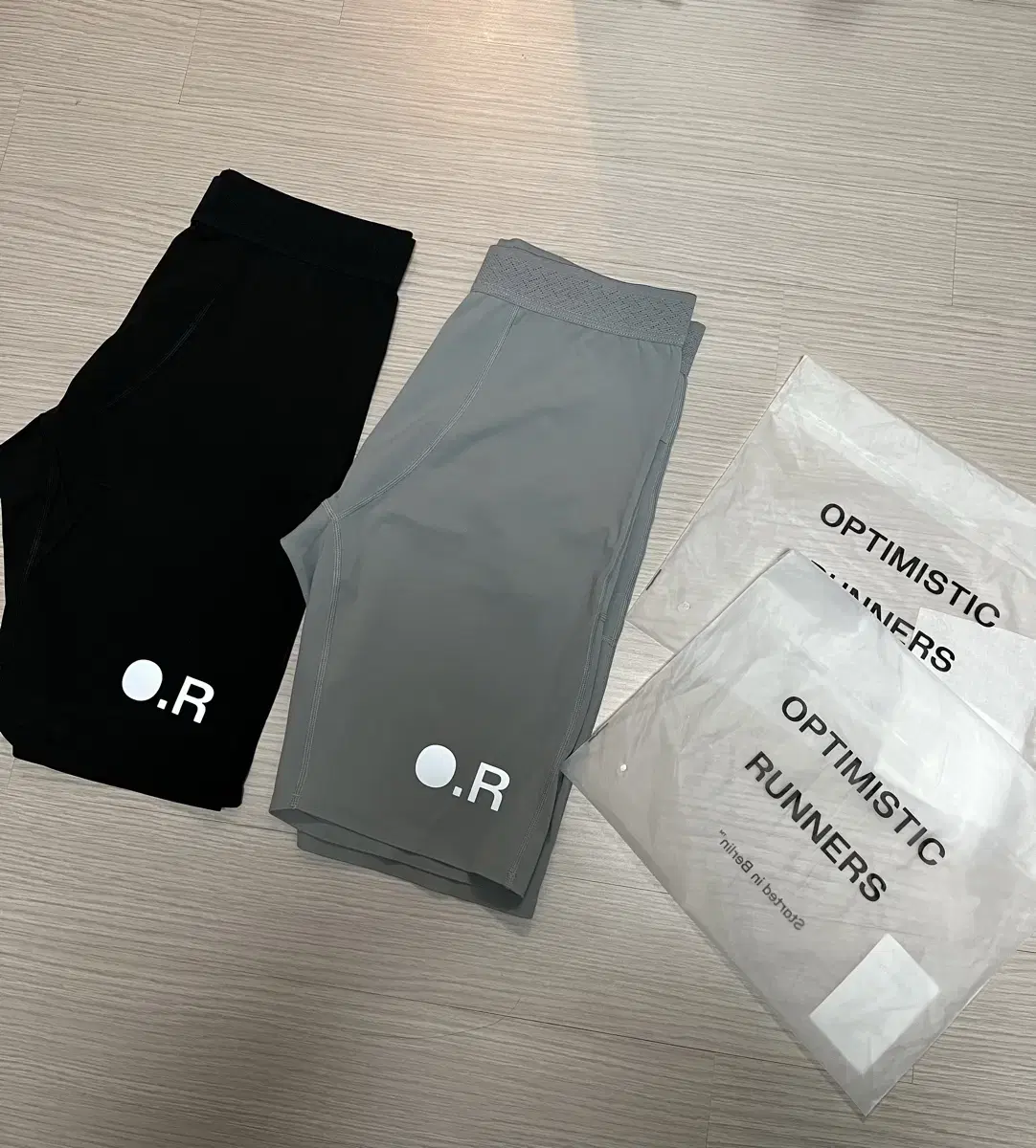 옵티미스틱러너스 Men's short tights(블랙,그레이)M